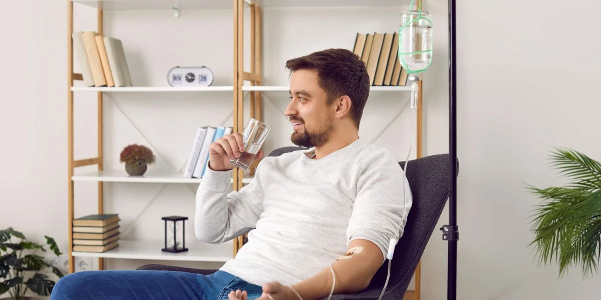Man relaxing during IV therapy session for energy boost and hydration in Middletown, NY